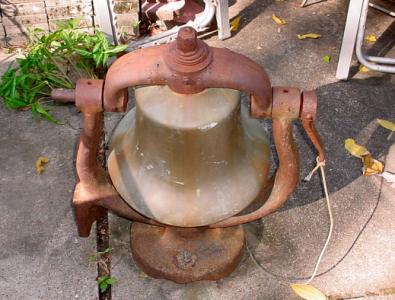 Bell is bolted to patio